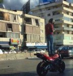 this-guy-had-to-stop-and-text-everyone-about-the-building-with-curtains-on-the-outside.jpg
