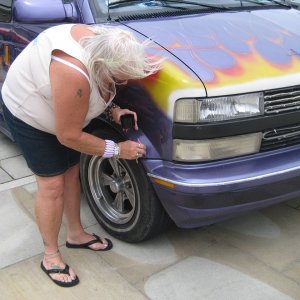 Jennie touching up the paint on Tims van.