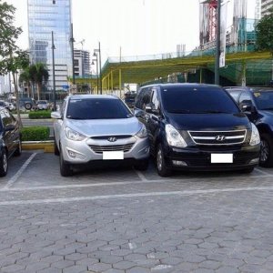 the van in the middle is getting a nice group hug