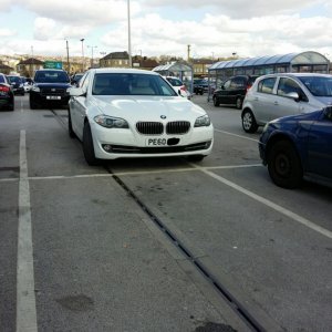 park like a dick so you can swing your huge set of balls out of the car like a pro