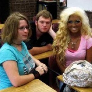 why is the guy in the middle so bored