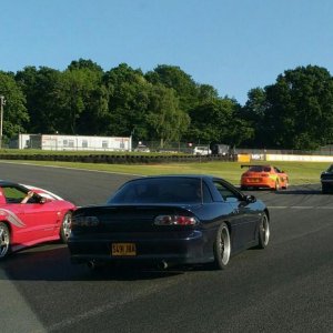 Lined up on the Brandhatch race track behind the fast & furious cars.