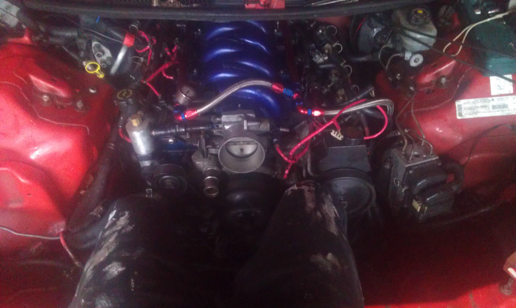 Engine way with radiator removed. Got a bit more room to work with now, so must I can now sit in there and get to things. Still give you back ache tho