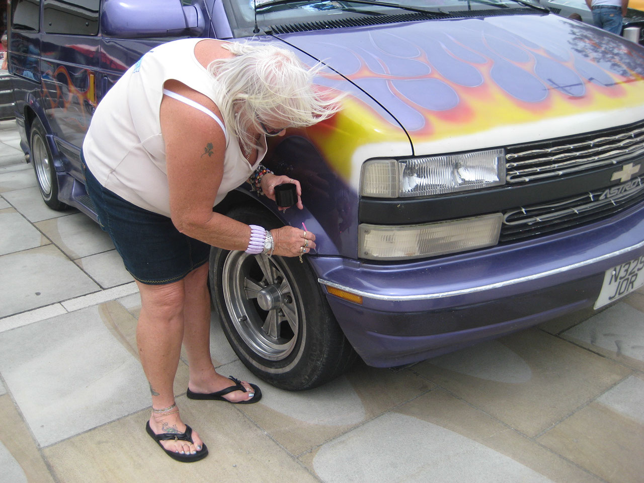 Jennie touching up the paint on Tims van.