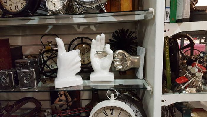 well done old antique shop owner