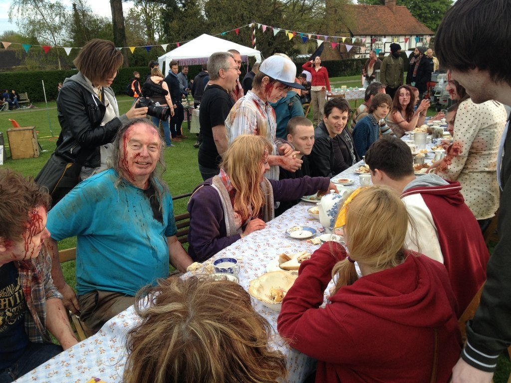 Zombies and Village Folk enjoying a day of....sharing food. No brains here!